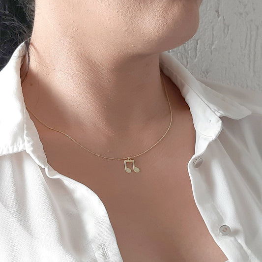 Gold Musical Pendant